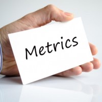 hand holding metrics card: SEO Legal Marketing Blog